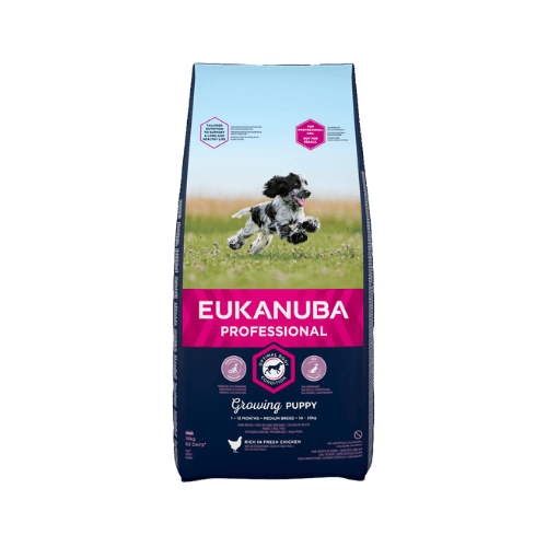 En förpackning av Eukanuba Professional Puppy Medium Breed hundmat, med en bild av en hoppande svartvit valp på en grön äng.