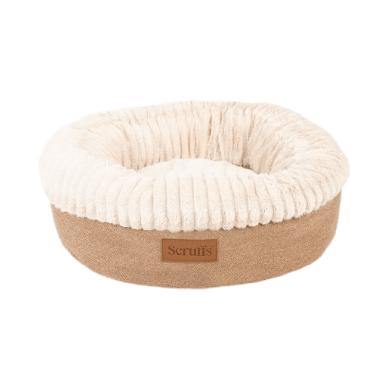 Scruffs Ellen Donut hundbädd i beige, rund och mjuk design för extra komfort och stöd för hundar.